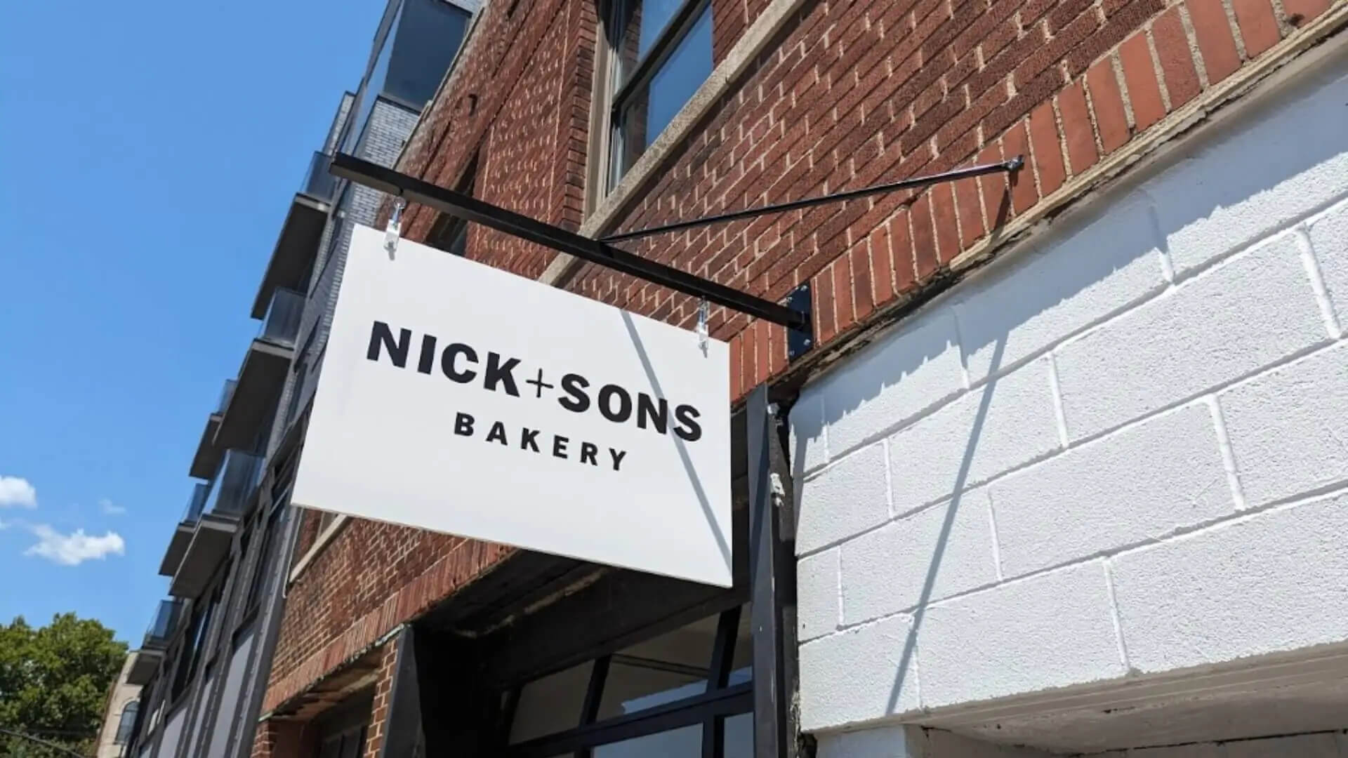 nick-and-sons-bakery-handing-outdoor-blade-sign