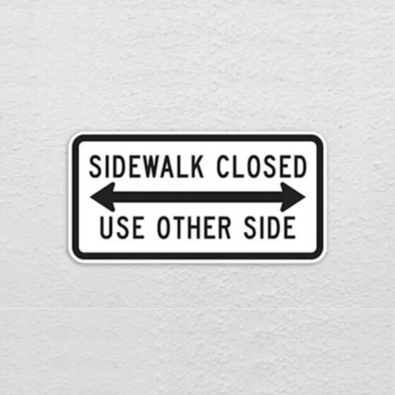 sidewalk closed use other side sign