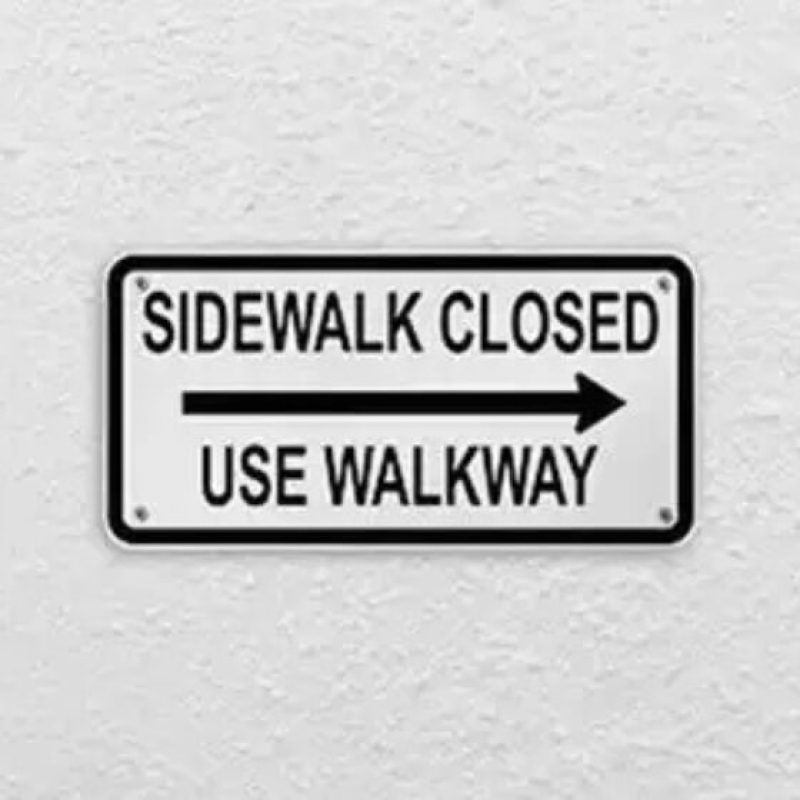 sidewalk closed use walkway sign